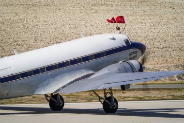 ESKISEHIR, TURKIYE - SEPTEMBER 22, 2024: Private Douglas DC-3A (2204) display in Sivrihisar SHG Airshow clipart