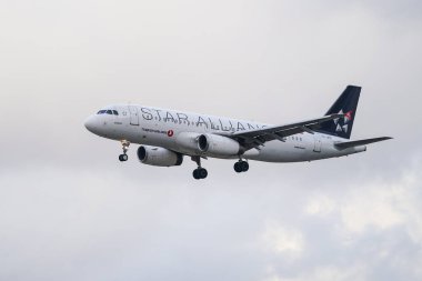 ISTANBUL, TURKIYE - JULY 11, 2024: Turkish Airlines Airbus A320-232 (3718) landing to Istanbul International Airport clipart