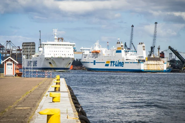 stock image Swinoujscie, West Pomeranian - Poland - July 15, 2022: View on TT-Line Nils Dacke ferry leaving and Unity Line Gryf ferry entering to port in Swinoujscie. Transport passengers and cars