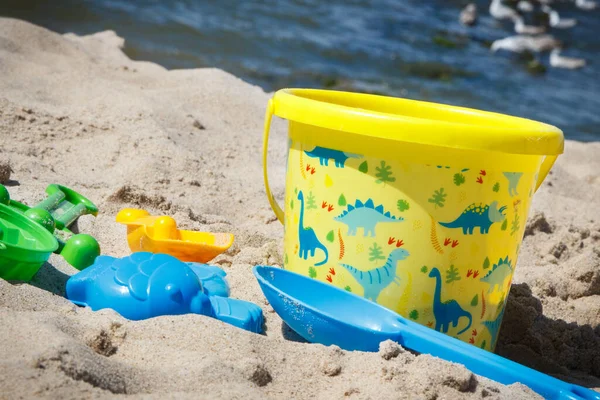 stock image Children plastic toys for relax or playing on sand at summer beach. Vacation time