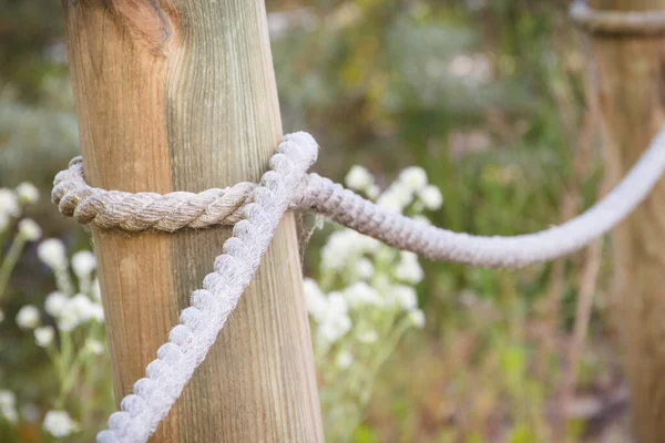 Closeup Fence Made Rope Wooden Pole Public Park — Stock Photo, Image