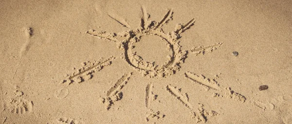 stock image Shape of sun on sand at beach. Concept of summer and vacation time