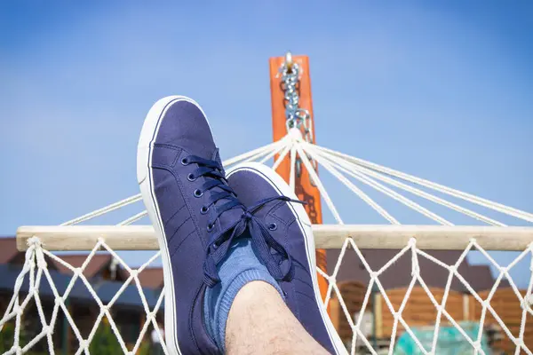 stock image Relaxing in hammock in summer garden. Vacation time