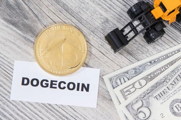 stock image Dogecoin, miniature excavator and dollar bills. Symbol of cryptocurrency. International network payment. Finance concept