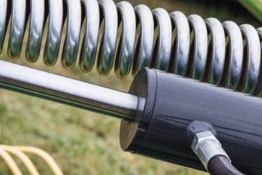 Piston, aktüatör ve çelik yay pnömatik ya da hidrolik makinenin bir parçası. Teknoloji ve mühendislik