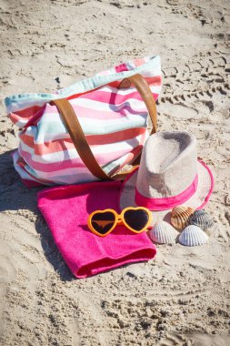 Accessories using for relax on sand at beach. Travel and vacation time concept