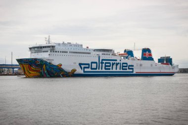 Swinoujscie, West Pomeranian - Poland - June 15, 2021: View on Cracovia ferry leaving port of Swinoujscie and sailing to Ystad. Transport passengers and cars