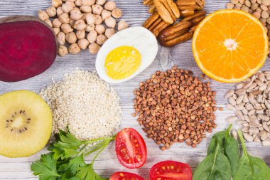 Various healthy products or ingredients containing natural vitamin B9 and other minerals