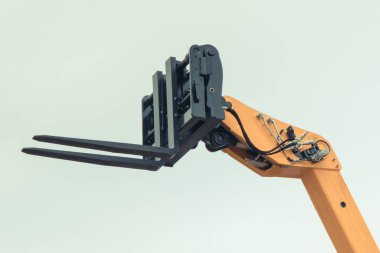 Forklift yükleyici ya da istifleyici. Detay ve endüstriyel makinedeki hidrolik ve pnömatik mekanizmanın bir parçası. Ulaşım teknolojisi