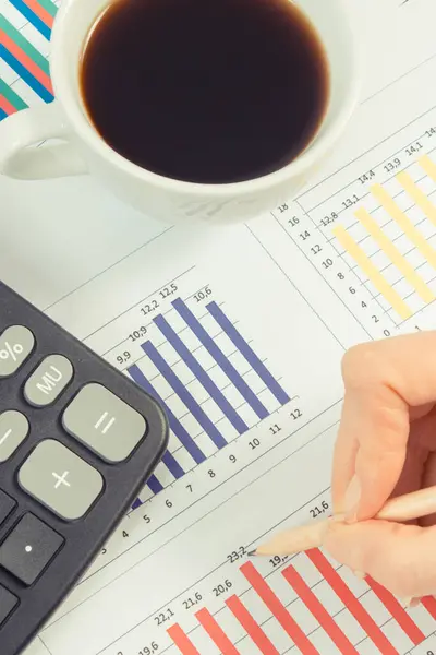 Cup Black Coffee Finger Showing Financial Chart Different Production Sales — Stock Photo, Image