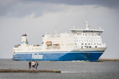 Swinoujscie, West Pomeranian - Poland - July 05, 2024: View on passengers and cars ferry Finnfellow sailing from Malmo to Swinoujscie. Transport across Baltic Sea clipart