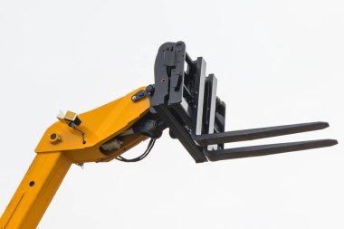 Forklift yükleyici ya da istifleyici. Endüstriyel makinedeki hidrolik ve pnömatik mekanizmanın bir parçası. Ulaşım teknolojisi