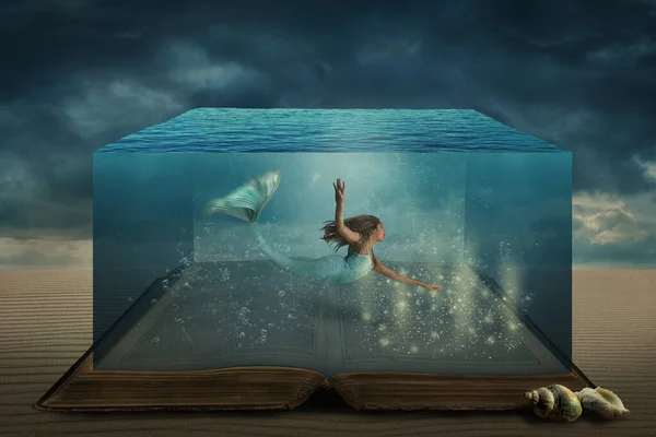 Ancient story book opens up to life in surreal fantasy of a lovely mermaid swimming in undersea magical adventure.