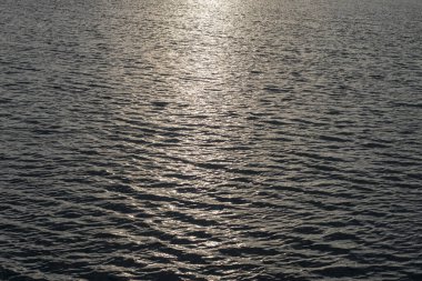 Dark sea or ocean water background, water surface.
