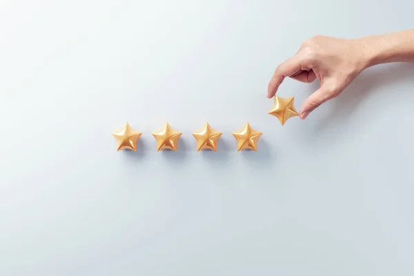 Customer satisfaction meter with star rating. evaluation, Woman hand showing on five star to increase rating, Satisfaction and best excellent services rating concept.
