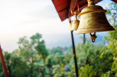 Bronze bells in Indian temple. Hindu temple bell. Brass made bell for Worshiping God. hanging bells. Lansdowne Hills. clipart