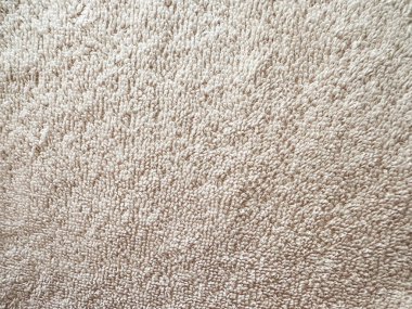 Kıvrık pamuklu havlu deseninin en üst görüntüsü. Bornoz. Sağlık, hijyen ve temizlik. Ev, banyo, otel, kaplıca