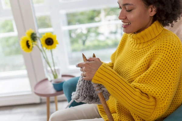 Beautiful Young Mixed Race Woman Sitting Armchair Knitting Scarf Relaxing — Stock Photo, Image