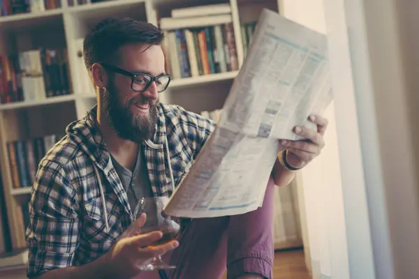 Handsome Young Man Reading Newspapers Having Drink His Home Library — Stock Photo, Image