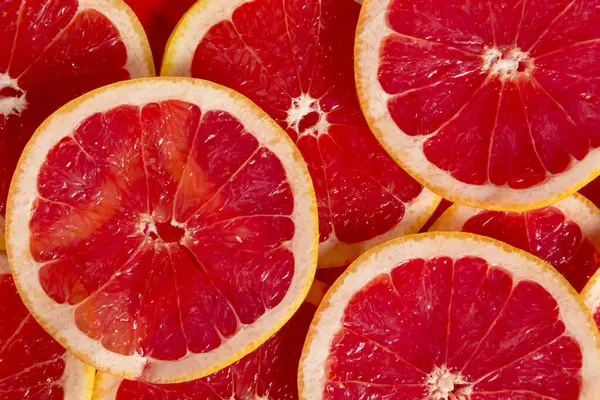 Top View Multiple Juicy Red Grapefruit Cross Sections Selective Focus — Stock Photo, Image