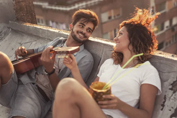 Young Couple Love Drinking Pineapple Cocktail Playing Guitar Having Fun — Stock Photo, Image