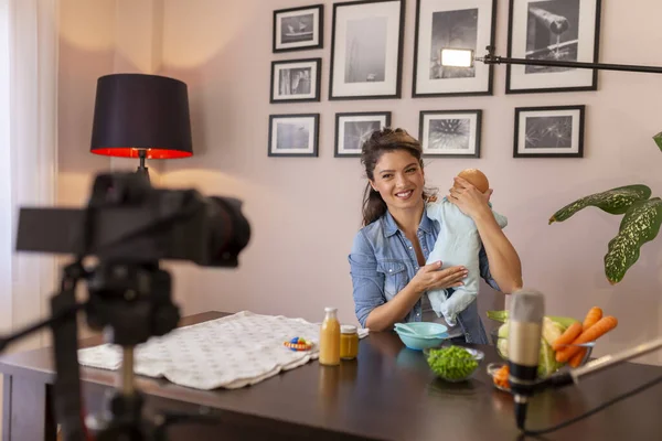 Female Vlogger Recording Video Baby Nutrition Burping Positions Feeding Part — Stock Photo, Image