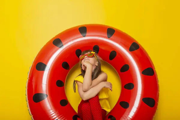 Child Sitting Inflatable Watermelon Shaped Swim Ring Daydreaming Beach Summer — Stock Photo, Image