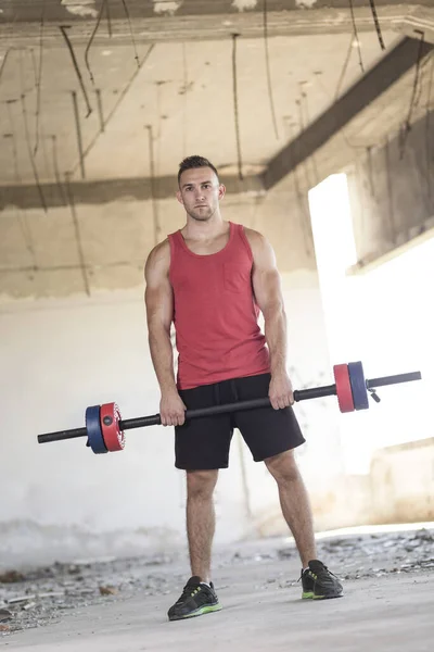 Muscular Sportsman Working Out Barbell Lifting Weights Abandoned Ruin Building — Stock Photo, Image