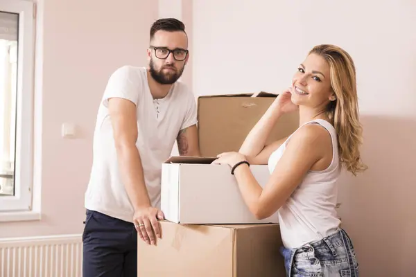 Young Couple Love Standing Next Cardboard Boxes New Apartment — Stock Photo, Image