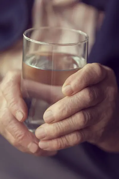 Close Elderly Woman Hands Holding Glass Water — Stock Photo, Image