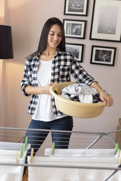 Beautiful Young Woman Standing Next Drying Rack Holding Washbowl Filled — Stock Photo, Image