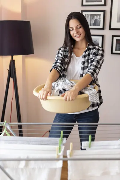 Beautiful Young Woman Standing Next Drying Rack Holding Washbowl Filled — Stock Photo, Image