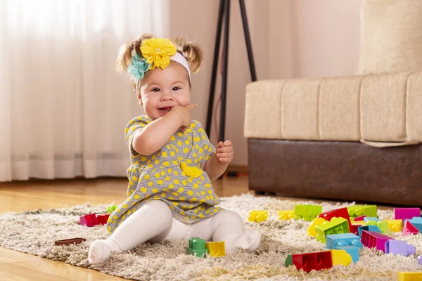 Beautiful Little Baby Girl Sitting Carpet Nursery Floor Chewing Her — Stock Photo, Image