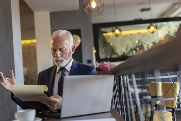 Senior Businessman Sitting Restaurant Table Working Laptop Computer Analyzing Documentation — Stock Photo, Image