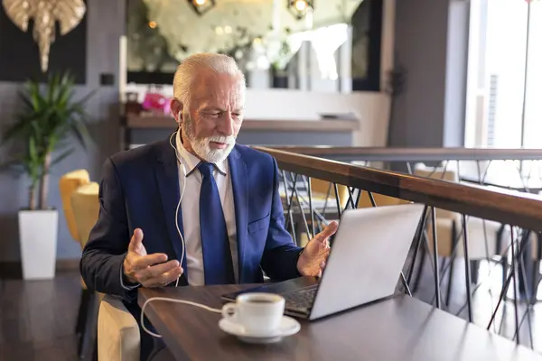 Senior Businessman Sitting Restaurant Table Drinking Coffee Having Conference Call — Stock Photo, Image
