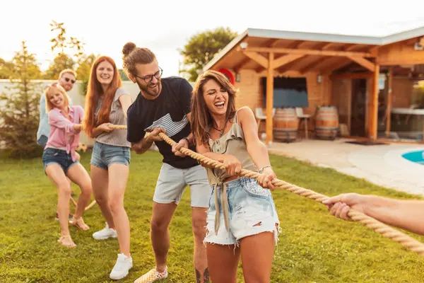 Young Team Having Fun Competing Tug War Game While Team — Stock Photo, Image