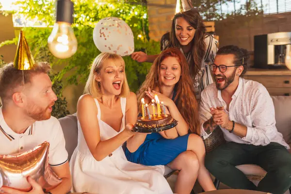 Group Friends Having Fun Birthday Party Birthday Girl Blowing Out — Stock Photo, Image