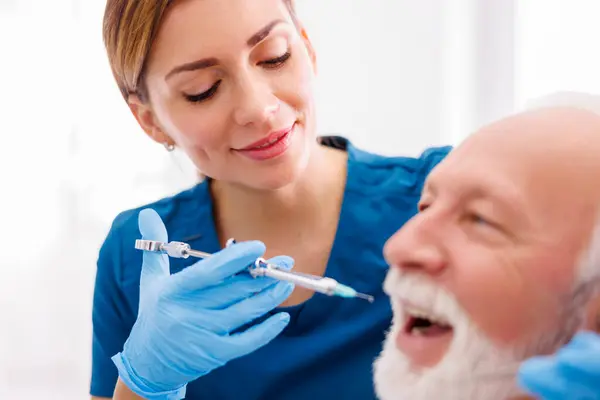 Dentist Applying Local Anesthetic Patient Numbing Pain Procedure — Stock Photo, Image