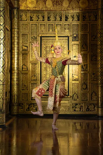 stock image Pantomime (Khon) is traditional Thai classic masked play enacting scenes from the Ramakien (Ramayana) with a backdrop of Thai paintings in a public place at Wat Phra Khao, Ayutthaya province, Thailand