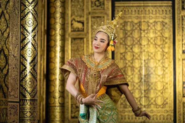 stock image Pantomime (Khon) is traditional Thai classic masked play enacting scenes from the Ramakien (Ramayana) with a backdrop of Thai paintings in a public place at Wat Phra Khao, Ayutthaya province, Thailand