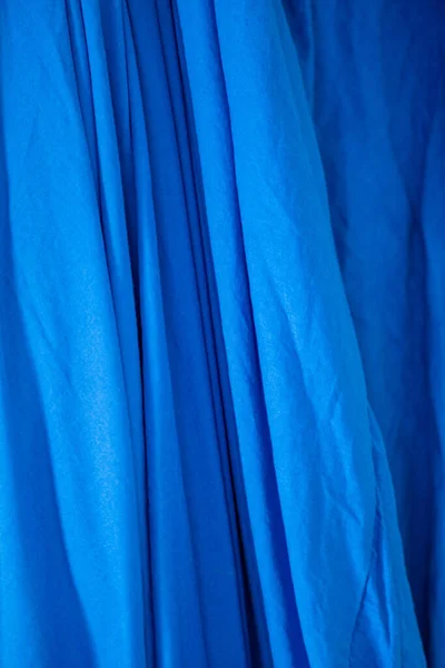 blue curtain with folds. full frame capture