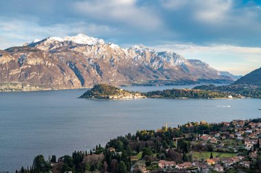 The panorama of Lake Como, from the church of San Martino in Griante, showing Bellagio and the surrounding mountains.