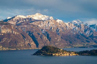 The panorama of Lake Como, from the church of San Martino in Griante, showing Bellagio and the surrounding mountains.