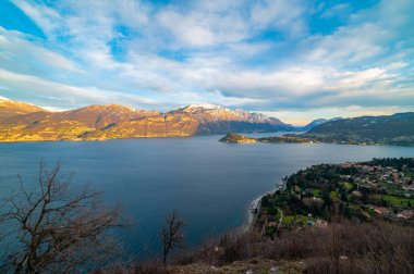 The panorama of Lake Como, from the church of San Martino in Griante, showing Bellagio and the surrounding mountains.
