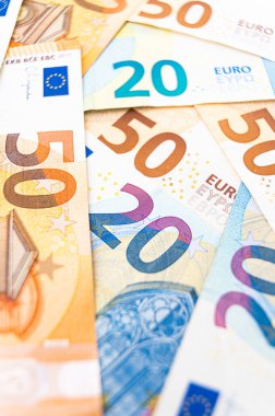 Banknotes of 20 and 50 euros arranged disorderly. Value for money.