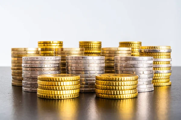 Stacks Coins Next Each Other Black Surface Amount Money Wealth — Stock Photo, Image