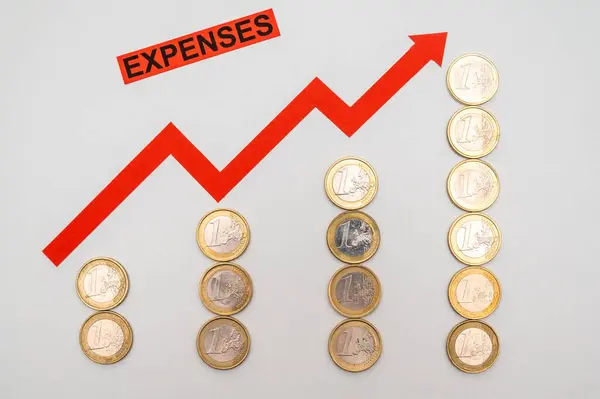 Rows Coins Increasing Height Word Red Arrow Pointing Increase Expenses — Stock Photo, Image