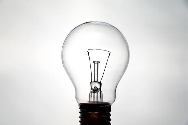 Зажигательная Лампочка Сфотографирована Фоне Света Который Кажется Включен Электричество Возобновляемые Лицензионные Стоковые Фото