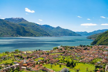 View of the upper Lake Como and the town of Dongo. clipart