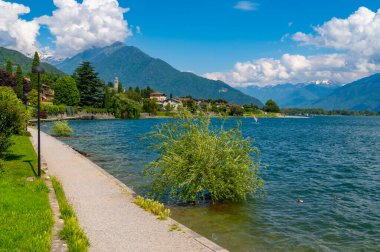 Lake Como, photographed by Gera Lario. View of the villages and mountains of the Upper Lake, and of the promenade along the lake. clipart